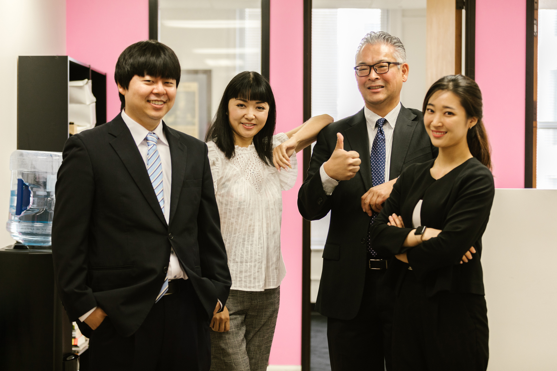 A People Posing in the Office Together